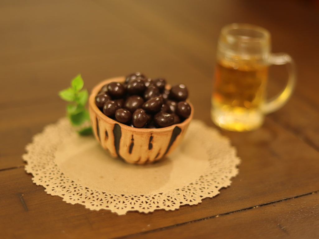 Grano de café cubierto de chocolate